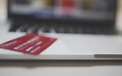 Payment card resting on a laptop keyboard