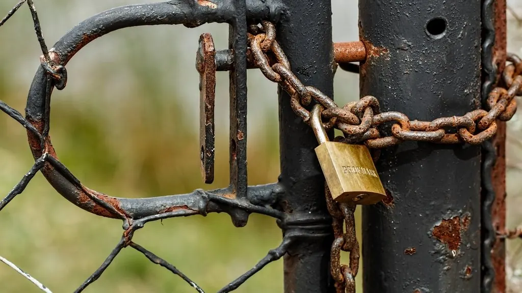 Padlock securing a gate, representing WordPress website security